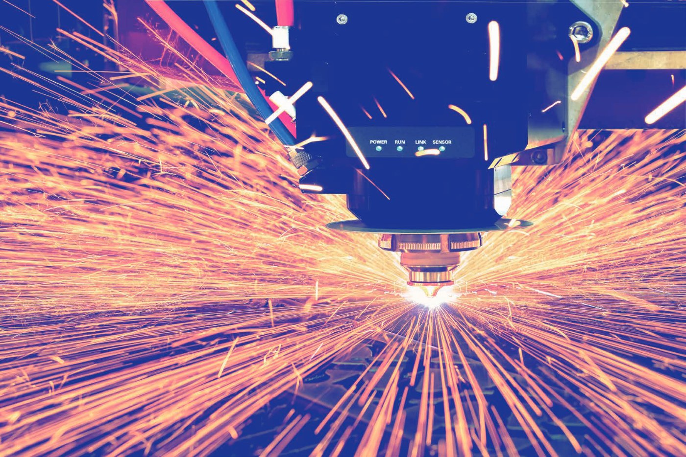 BOCI BLT fiber laser cutting head in operation — cutting steel with sparks