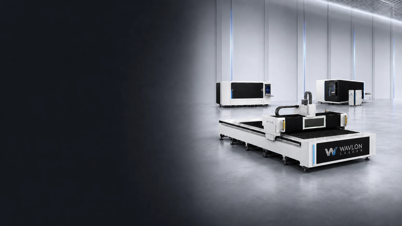 Three real Wavlon sheet laser systems presented on a premium industrial showroom floor